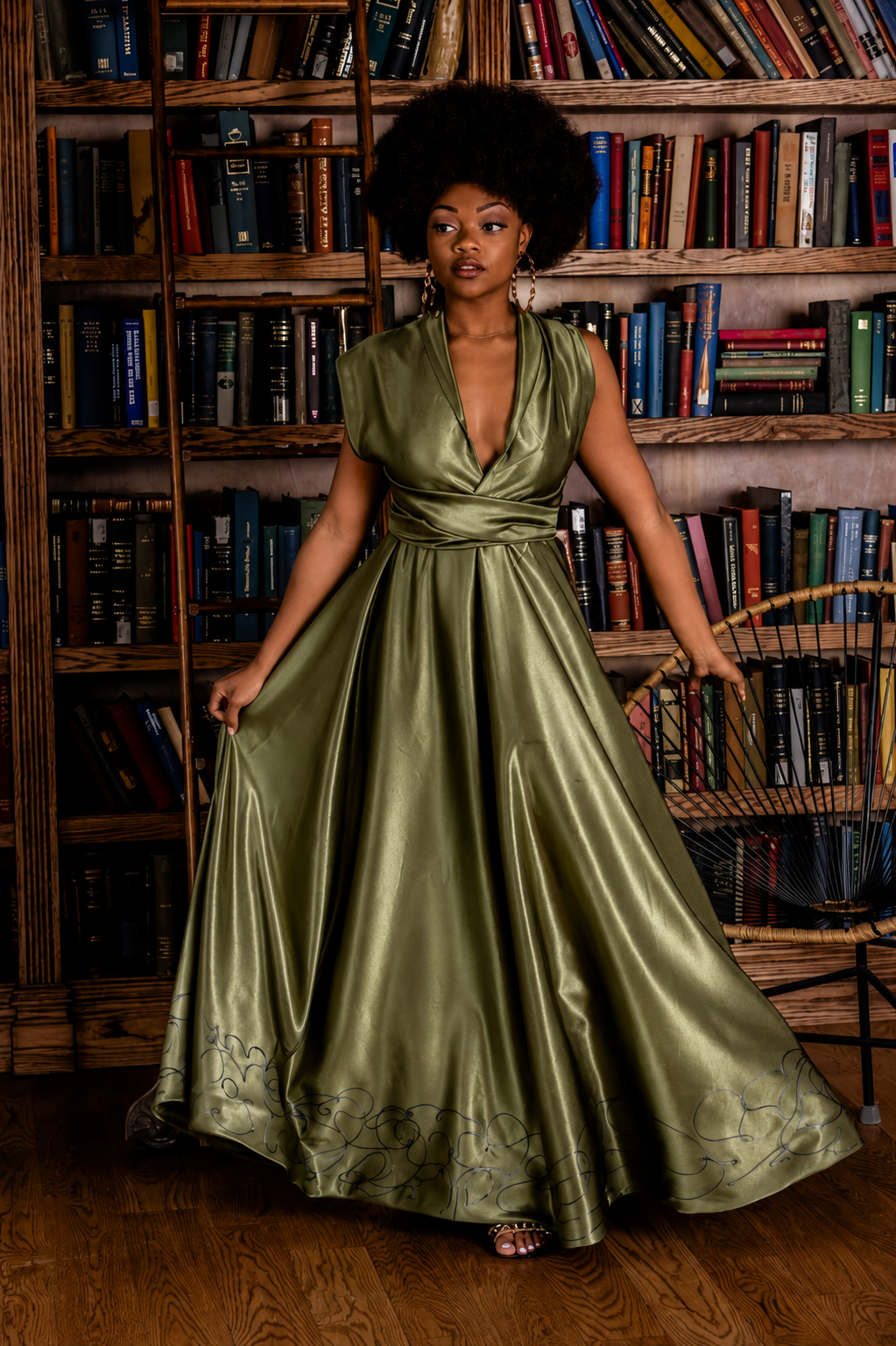 Olive satin wrap gown with hand-embroidered hem